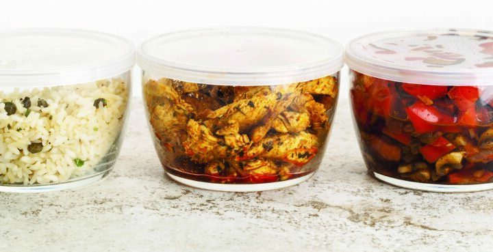 Meal prep stored in glass containers.