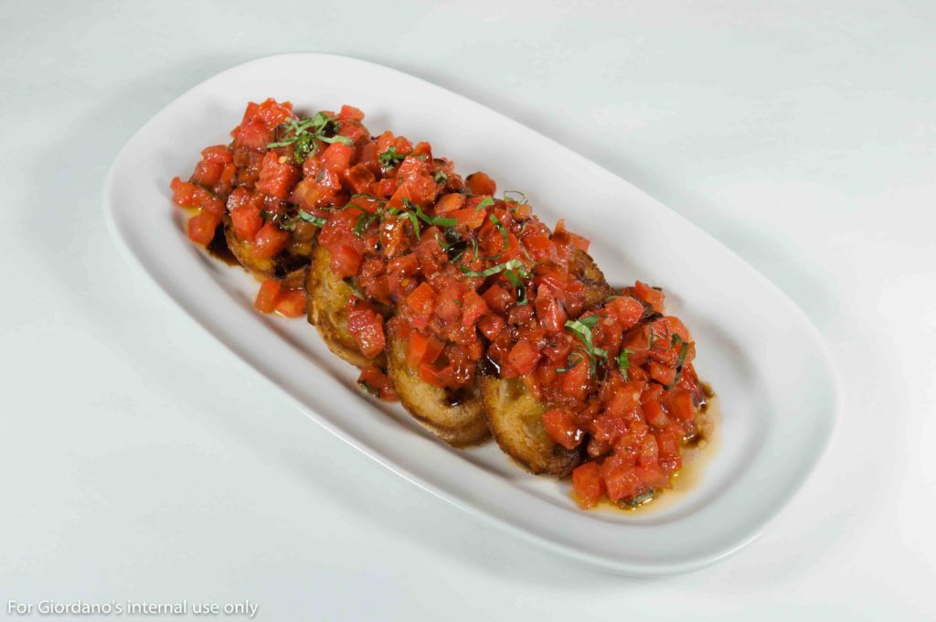 Not your normal bruschetta, this version adds a touch of balsamic glaze for a sweet finish.