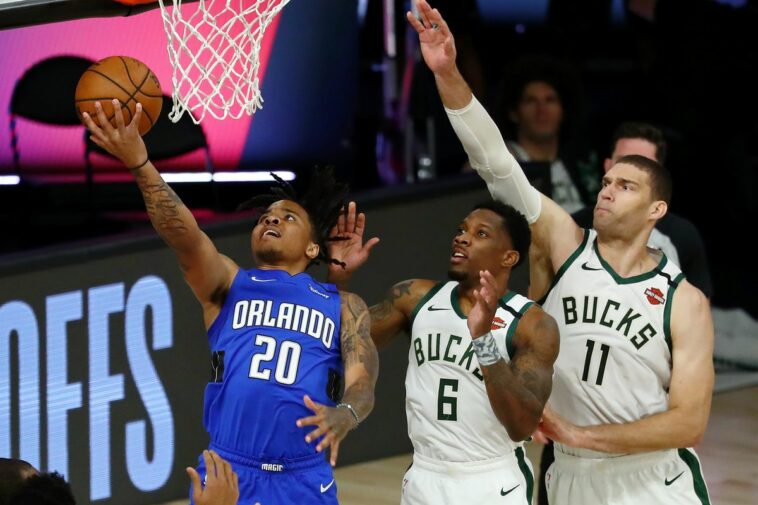 Orlando Magic guard Markelle Fultz finishes at the rim in Tuesday's Game 1 vs. the Milwaukee Bucks