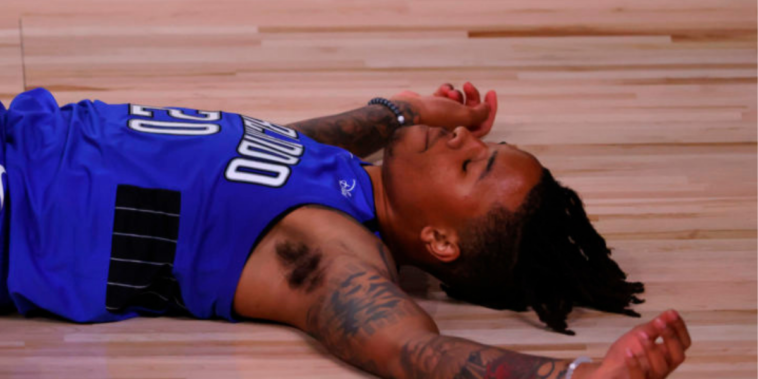 Markelle Fultz lays out on floor following inured knee suffered mid-game