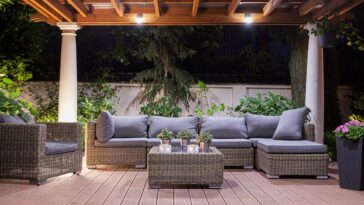 A patio with plants and a couch