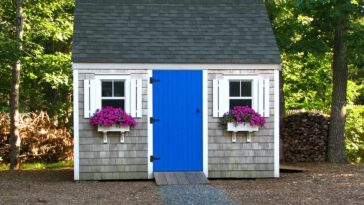 A she shed adorned with flowers