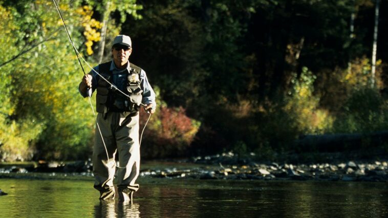 A man fishing after spine treatment