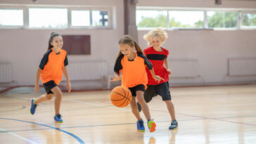 kids sports playing basketball