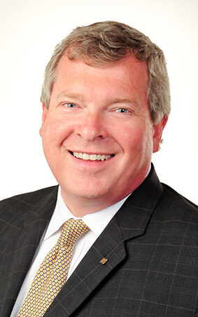 photo of Eric Schreck, Executive Vice President & Florida Regional President of Trustco Bank.