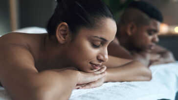 couple lying on a massage table