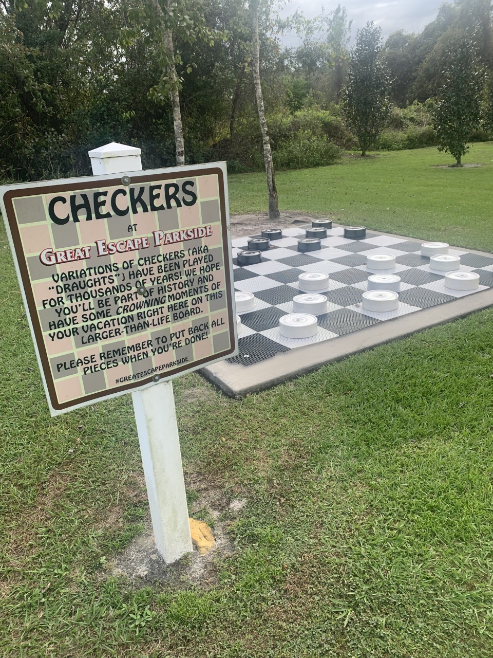 Photo of outdoor checkers game at Great Escape Parkside