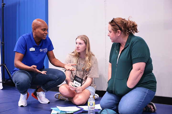 Youth receiving financial classes with Habitat for Humanity