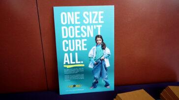 A poster of a child that is wearing oversized clothing to advertise childhood cancer awareness