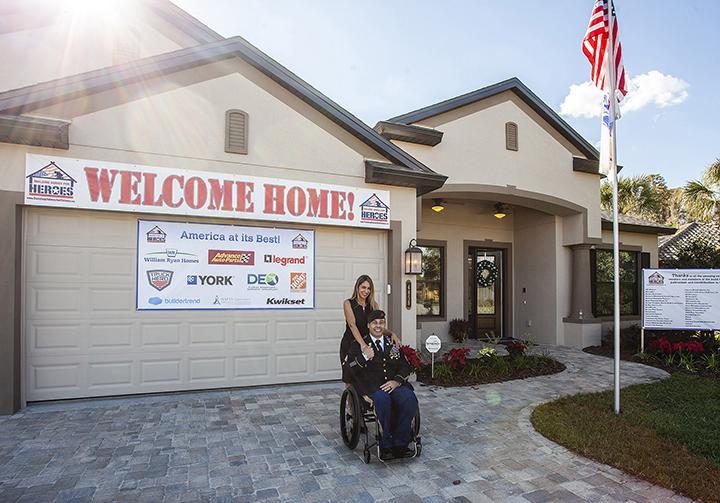 photo of a veteran at a ceremony put on by Building Homes for Heroes.