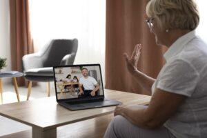 old-woman-having-videocall-with-her-family.