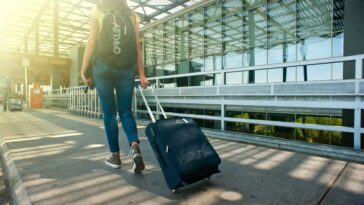 girl with rolling suitcase