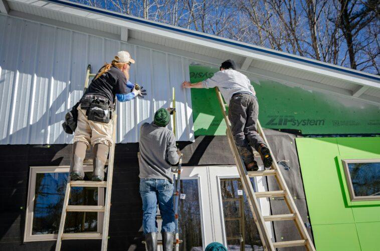 men working on house